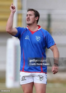 ANTANANARIVO, MADAGASCAR - JULY 06:  Theuns Kotze of Namibia issues instructions during the Rugby World Cup 2015 qualifying match between Madagascar and Namibia at the Mahamasina Stadium on July 6, 2014 in Antananarivo, Madagascar.  (Photo by David Rogers/Getty Images)