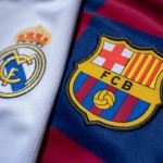 MANCHESTER, ENGLAND - JULY 22: The FC Barcelona and Real Madrid club crests on the first team home shirts on July 22, 2020 in Manchester, United Kingdom. (Photo by Visionhaus)